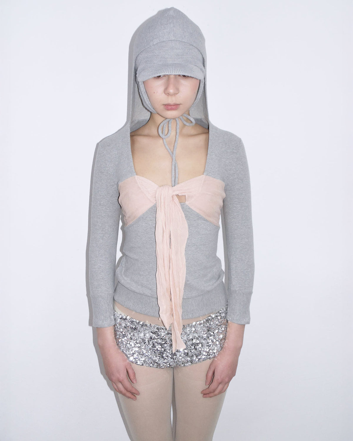 light gray hooded top with pink silk bow