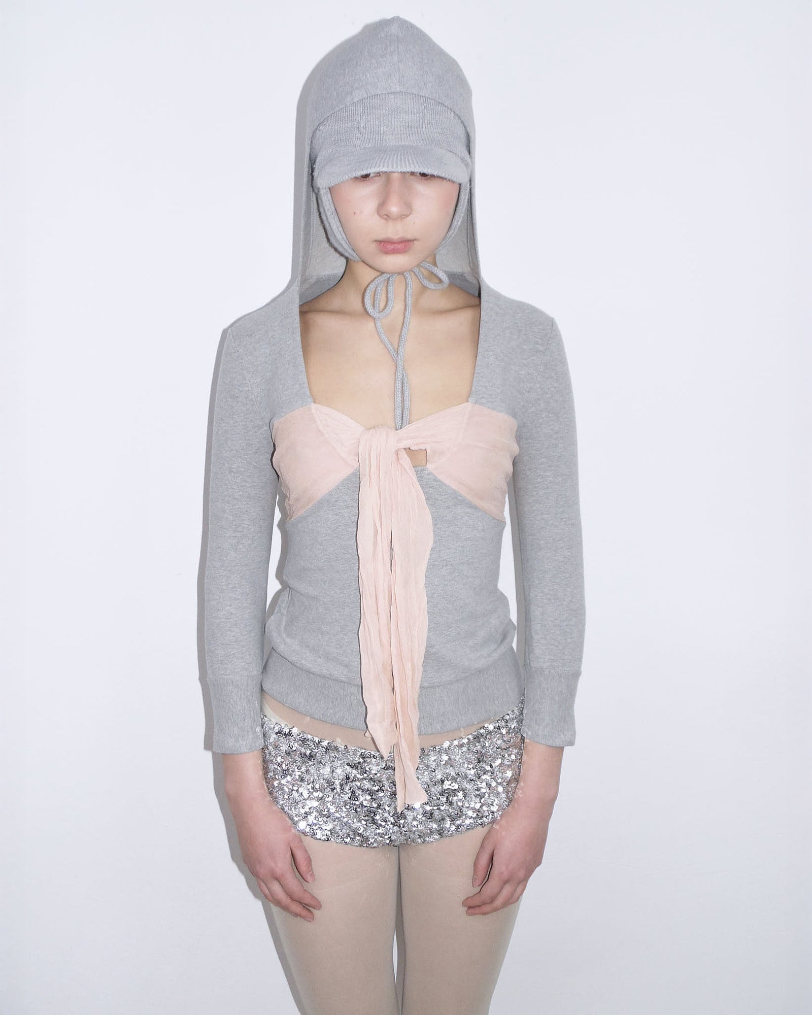 light gray hooded top with pink silk bow