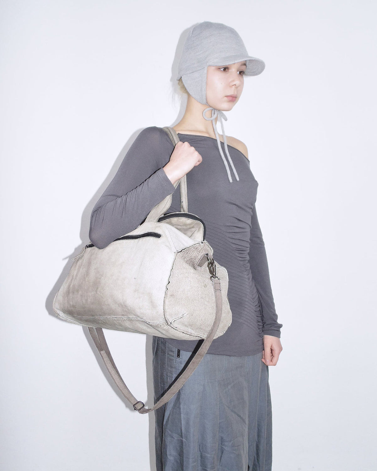 light grey leather duffle bag
