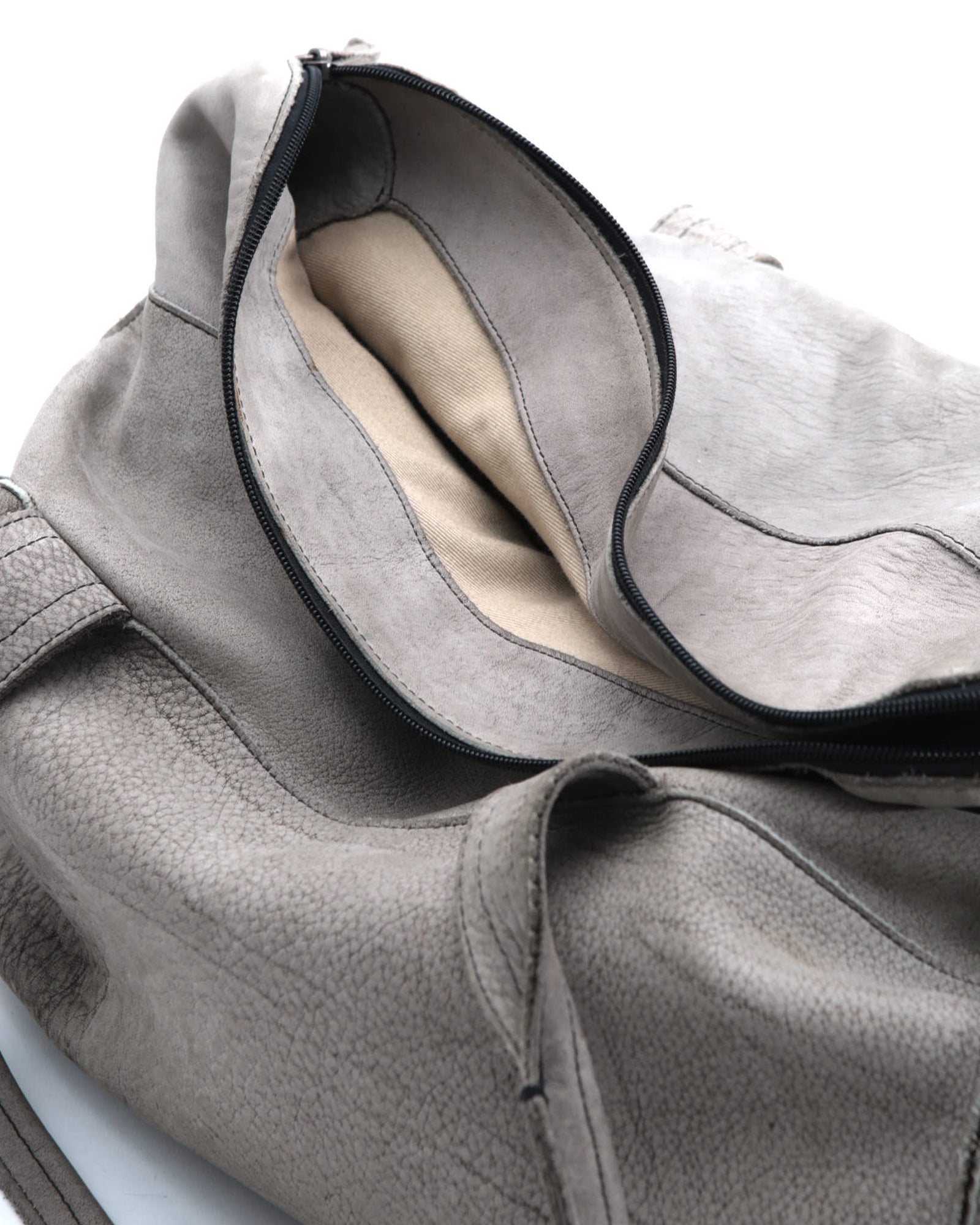 light grey leather duffle bag