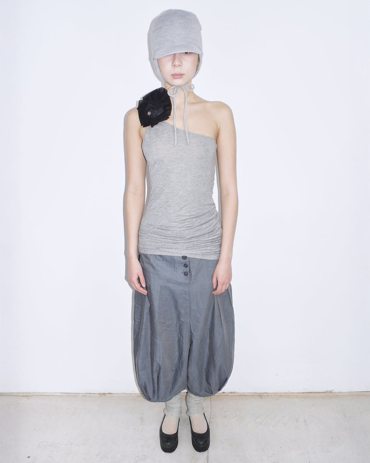 one-shoulder ruched top with brooch