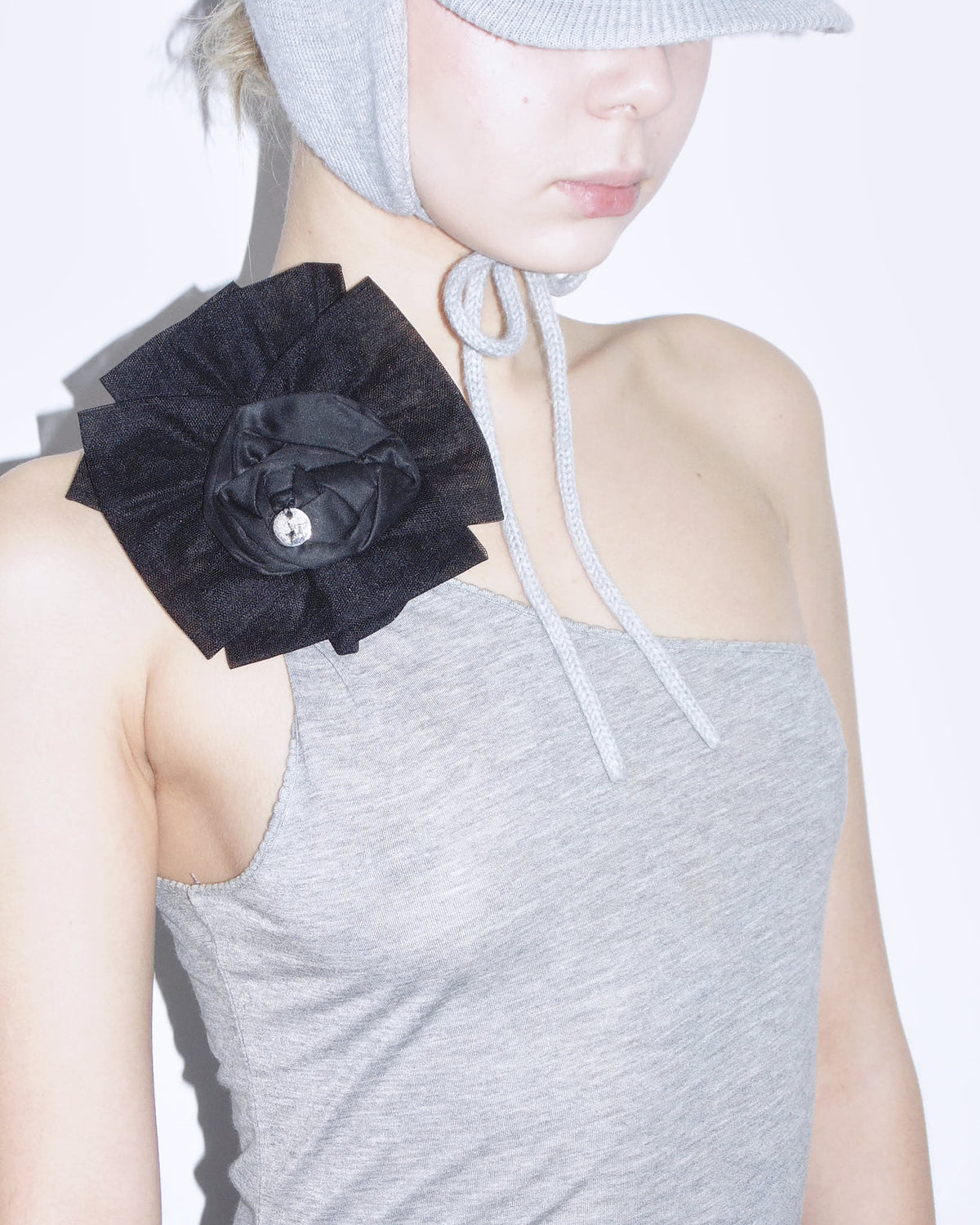 one-shoulder ruched top with brooch