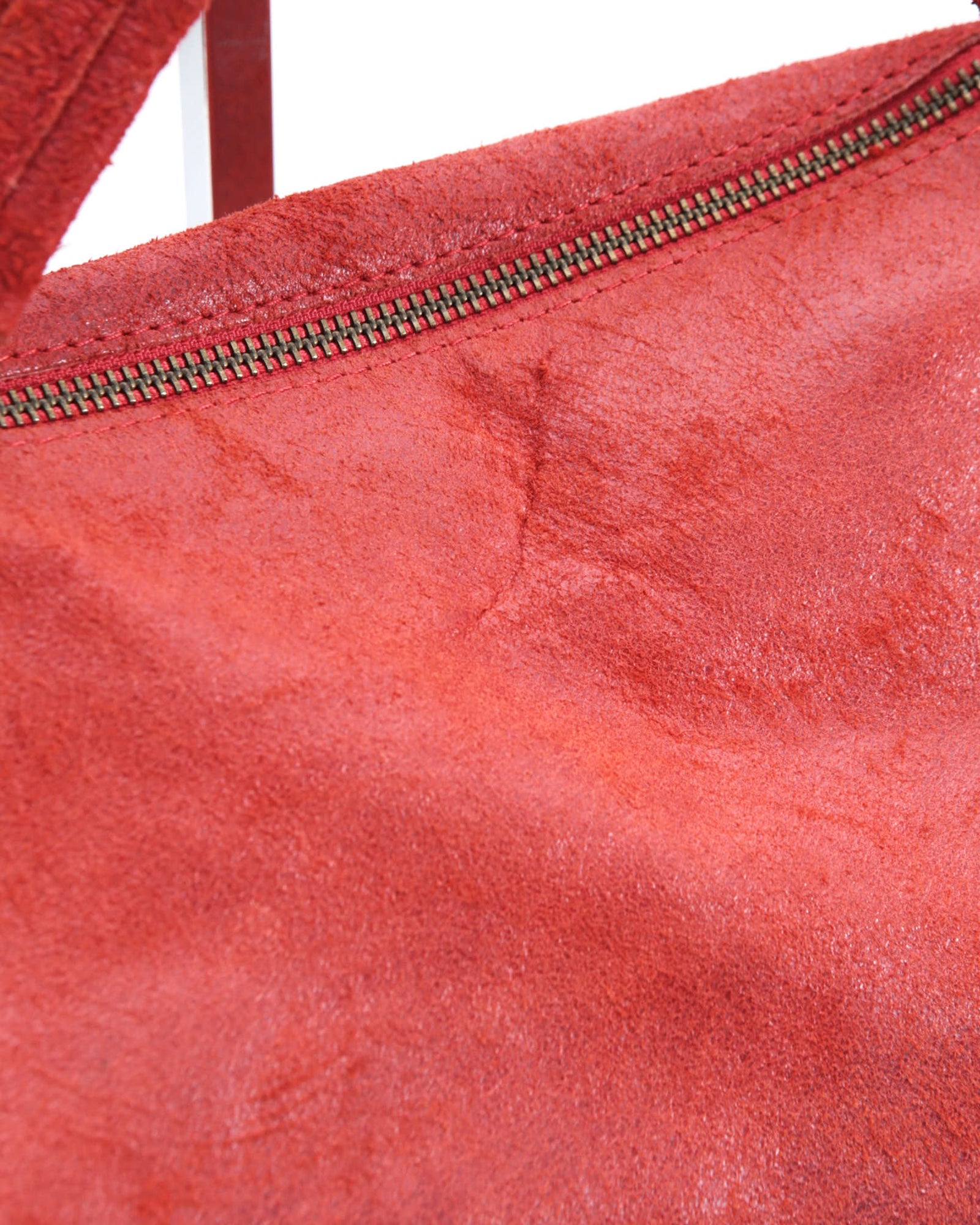 red studded leather tote bag