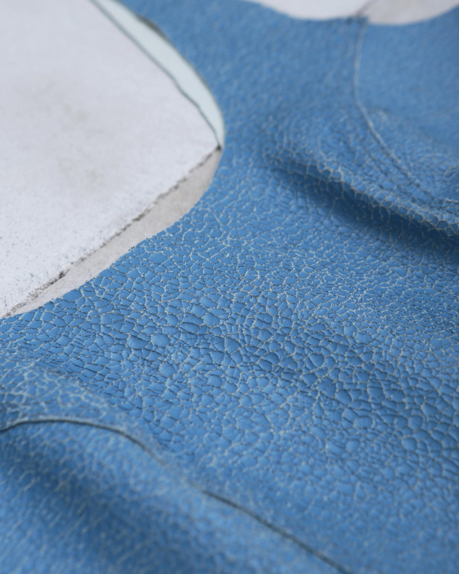 distressed leather blue cropped top