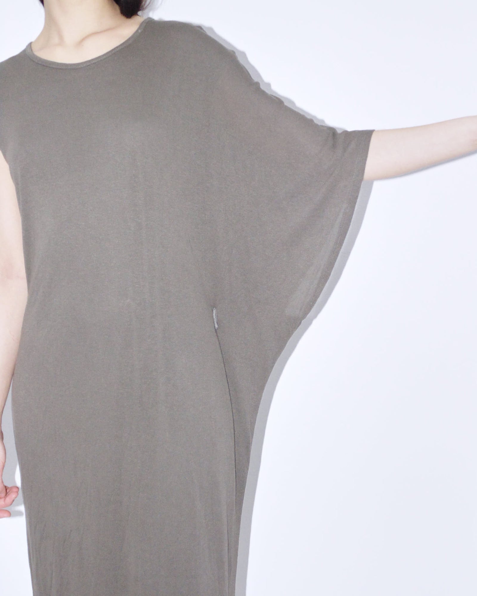 khaki dress with asymmetrical sleeves