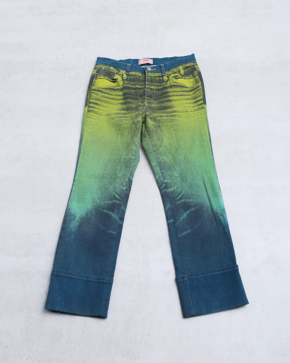acid green and blue washed denim jeans