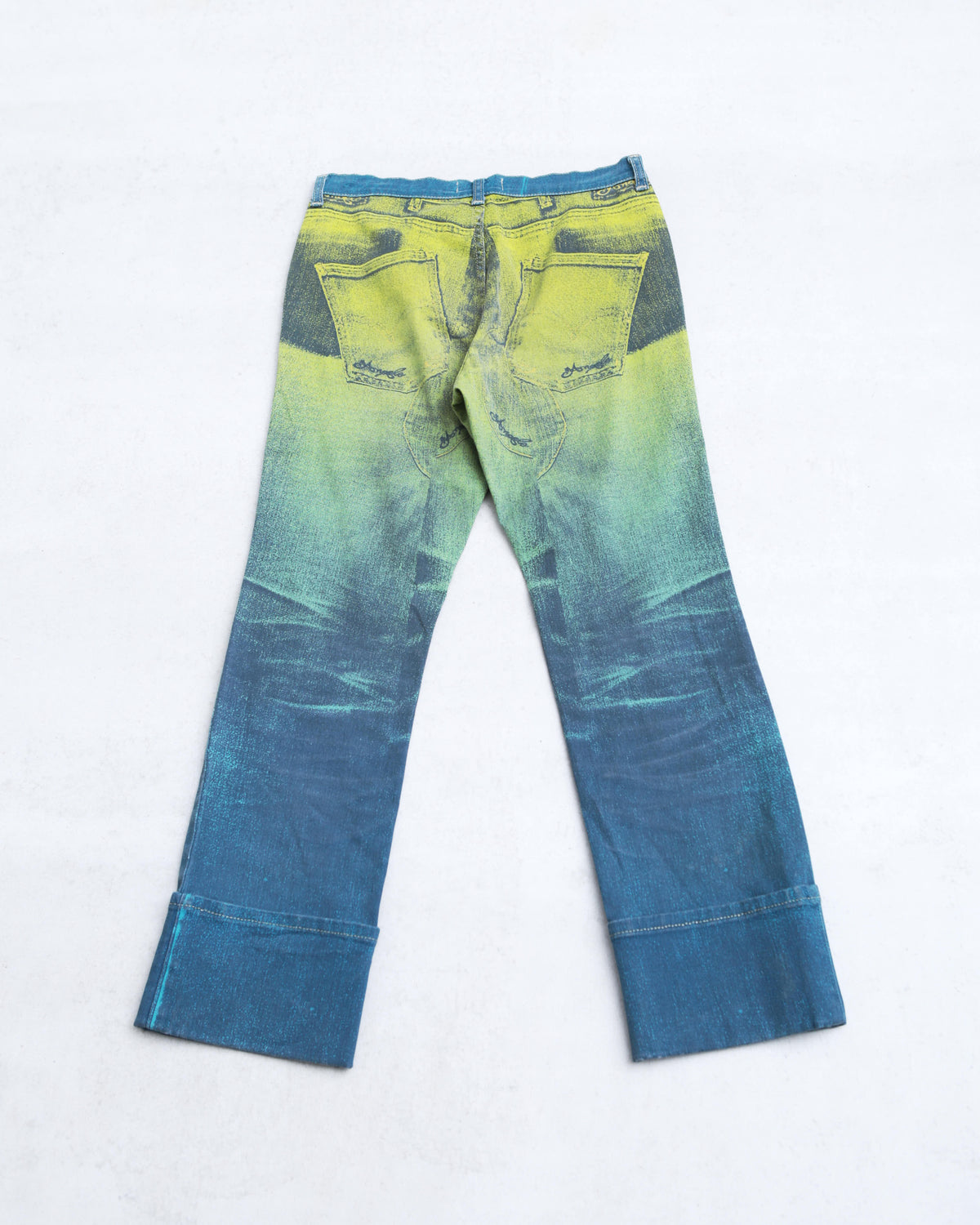 acid green and blue washed denim jeans